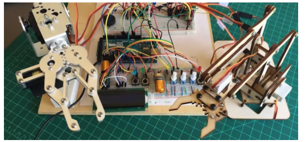 Develop a project to control and program a robotic arm